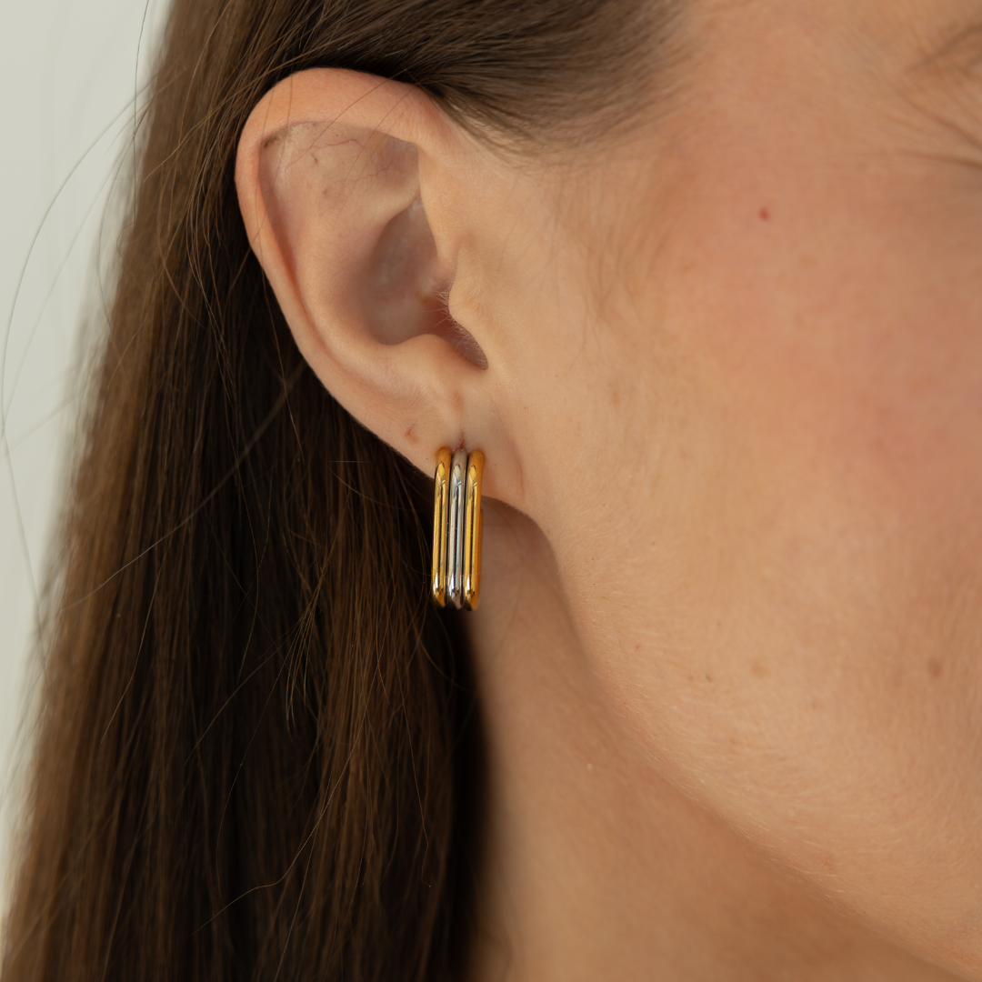 Two tone triple hoops